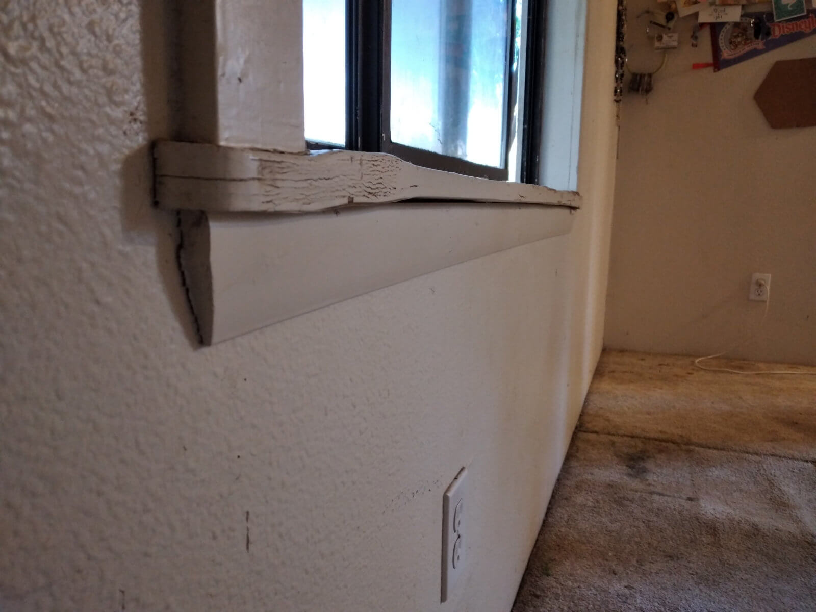 moisture-damaged window sill